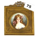 An Edwardian gilt framed hand painted miniature of a young woman, 10.5 x 10.5cm.