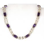 A 18ct yellow gold (stamped 14k) amethyst and pearl set necklace, L. 40cm.