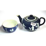 A Wedgwood teapot and dish.