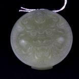 A Chinese carved nephrite jade buckle, Dia. 6cm.