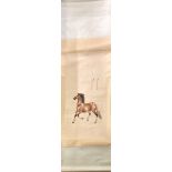 A Chinese silk mounted scroll painting of a horse, 65 x 210cm.