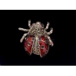 A 925 silver ladybird shaped enamelled ring set with rubies, (R).