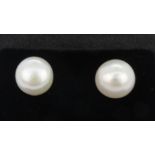 A pair of 925 silver pearl set stud earrings, Dia. 7mm.