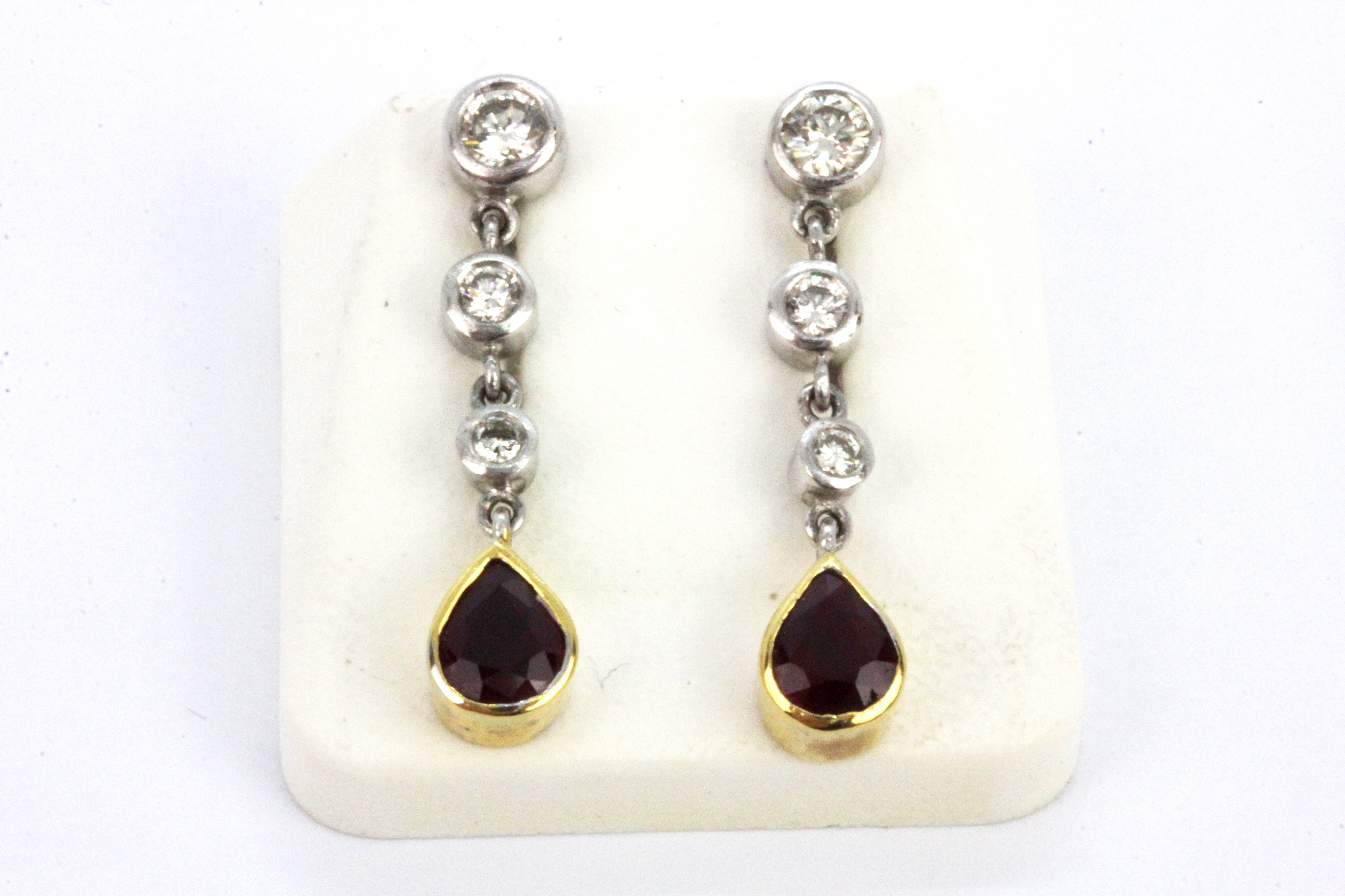 A pair of 18ct white gold drop earrings set with pear cut rubies and brilliant cut diamonds, L. 2. - Image 2 of 2