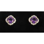 A pair of 18ct yellow gold stud earrings set with amethyst and diamonds, L. 0.6cm.