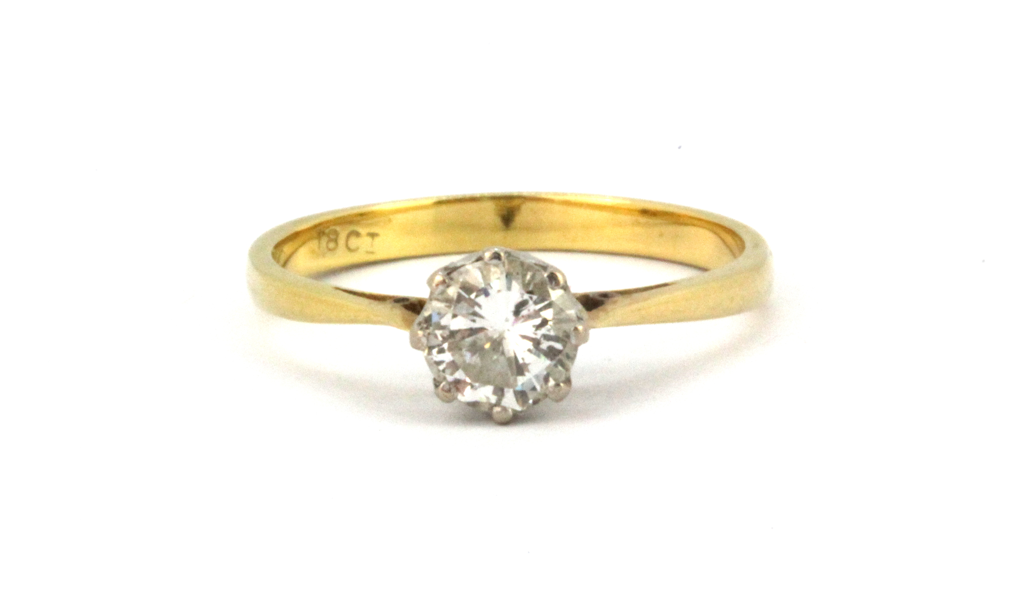 An 18ct yellow gold (stamped 18ct) solitaire ring set with a brilliant cut diamond, approx. 0.