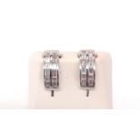 A pair of 18ct white gold diamond set hoop earrings, L. 1.5cm.