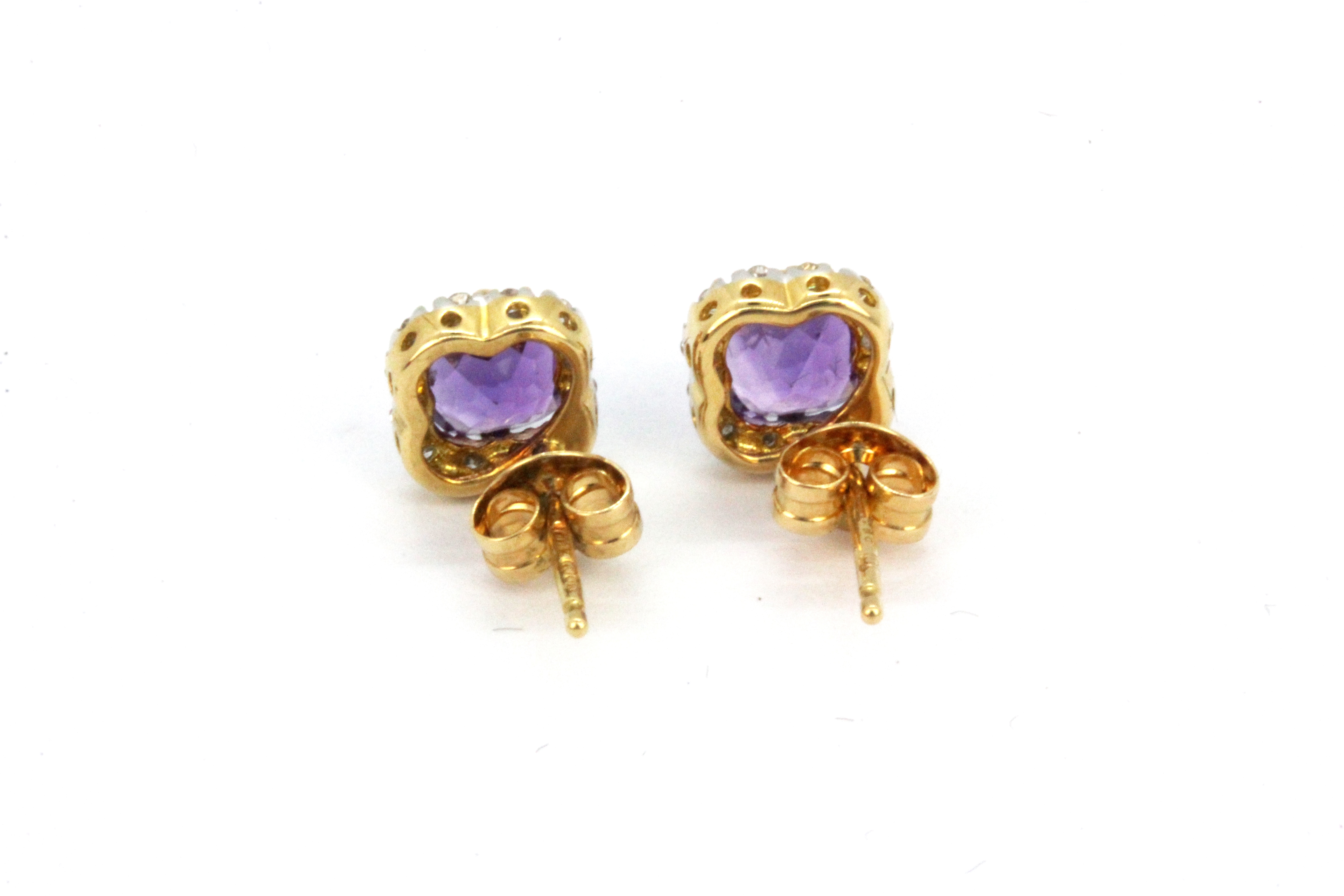 A pair of 18ct yellow gold stud earrings set with amethyst and diamonds, L. 0.6cm. - Image 2 of 2