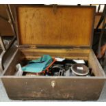 A vintage wooden box and contents, including a British rail signalling lamp, box size 64 x 34 x