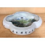 A mid 20th Century Chinese porcelain brush washing bowl decorated with characters and a river scene,