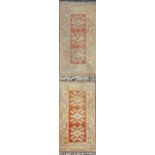 Two Eastern hand woven wool rugs, size 80 x 135cm.