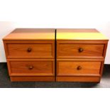 A pair of contemporary teak veneered bed side tables, 50 x 45 x 51cm.