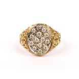 A gentleman's 9ct yellow gold stone set ring, (W).