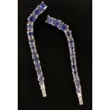 A pair of 925 silver tanzanite set graduated drop earrings, L. 5cm.