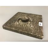 A rare Chinese Ming Dynasty carved stone calligrapher's paper weight decorated with the figure of