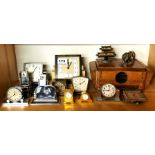 A group of vintage desk clocks and calendars.