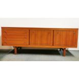 A 1970's teak sideboard, L. 180cm.