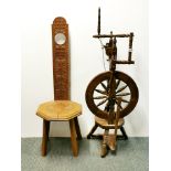 An old pine spinning wheel, H. 117cm and a carved oak spinning chair.