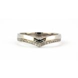 A 9ct white gold diamond set wishbone ring, (N).