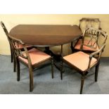 A mahogany veneered drop leaf table with a set a four chairs, extended 120 x 120 x 70cm.