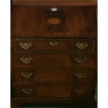 An inlaid mahogany veneered bureau, W. 74cm H. 92cm.