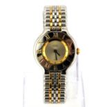 A lady's stainless steel Must de Cartier gilt wrist watch. Understood to be in good working
