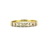 An 18ct yellow gold half eternity ring set wit brilliant cut diamonds, approx. 0.55ct overall, (N).