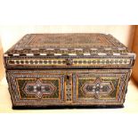 Islamic interest. A 19th Century micro-mosaic decorated wooden casket, 35 x 24 x 19cm.