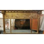 A 19th Century relief decorated gilt wood overmantle mirror, W. 140cm H. 89cm.