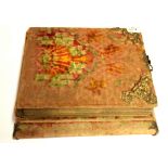 A very unusual Victorian musical photograph album in working order and with photograph contents,