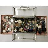 A box of mixed wrist watches, watch cases, etc. Condition : sold as seen, none are tested.