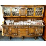 A carved oak and leaded glass dresser, 186 x 160 x 43cm.