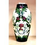 A Moorcroft Thistle pattern vase, H. 20cm.