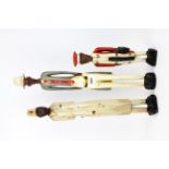 A group of three painted carved wooden colonial figures, tallest H. 54cm.