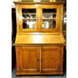 A 19th century Biedermeier fruitwood bureau cabinet, 128 x 190cm.