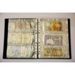 An album of mixed foreign bank notes and stamps.