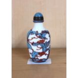 A Chinese signed three layer carved Peking cameo glass snuff bottle decorated with butterflies and