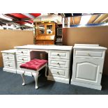 A white finished pine dressing table, 140 x 52 x 74cm, together with a matching bed side cabinet, 50