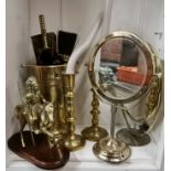 A brass native American Indian figure, pair of candlesticks, companion set and two mirrors.