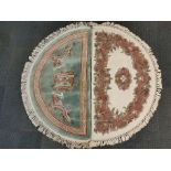 A semi-circular washed wool Chinese rug decorated with dragons together with a hand made semi-