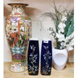 A large Japanese porcelain vase, a pair of Japanese vases and a further vase, tallest H.63cm.