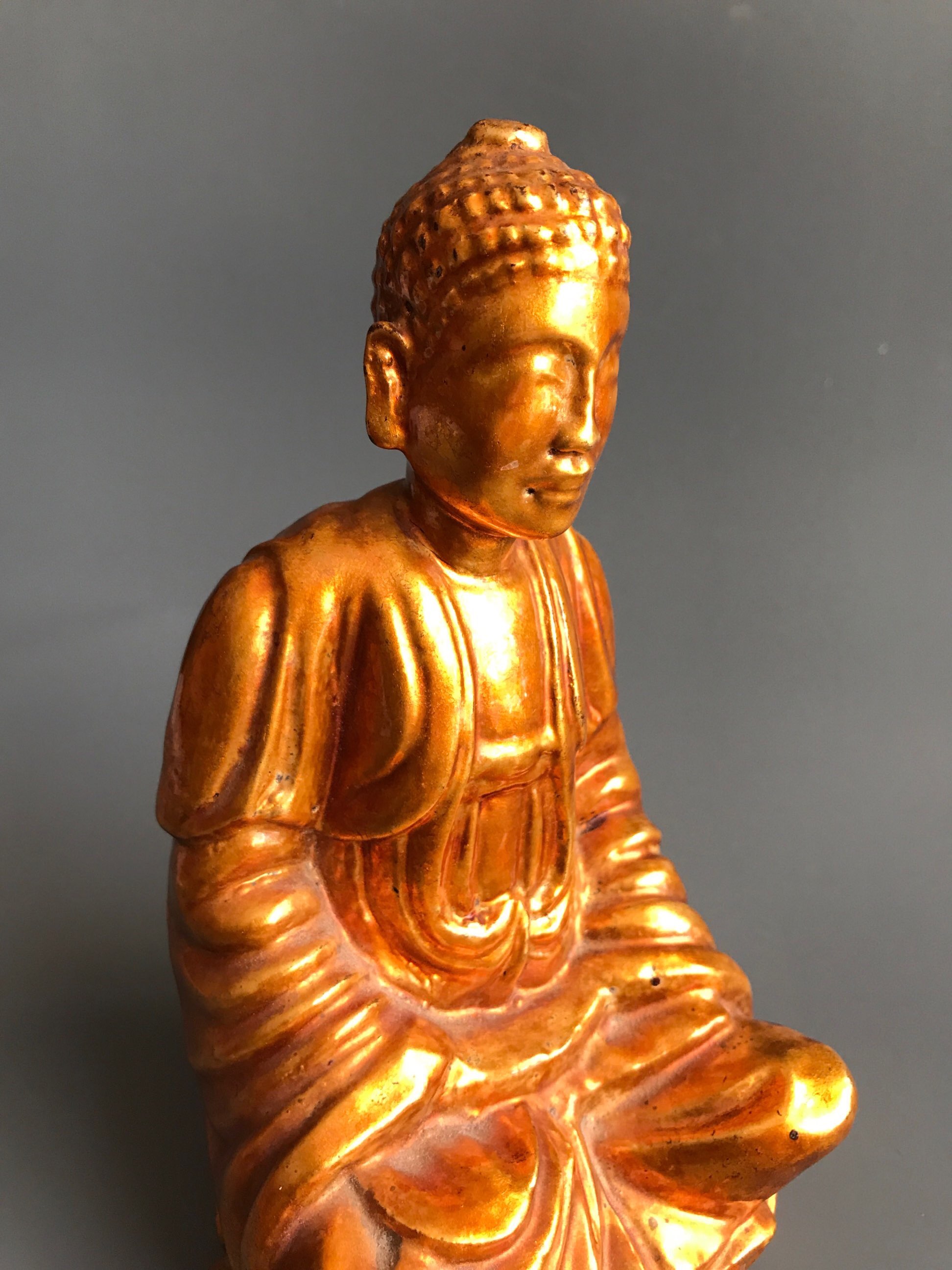 A mid 20thC gilt lacquer finished carved wooden figure of the Buddha seated on a lotus throne. H. - Image 4 of 4