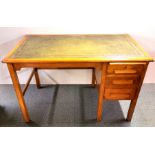 An oak leather topped desk, 120 x 68 x 76cm.