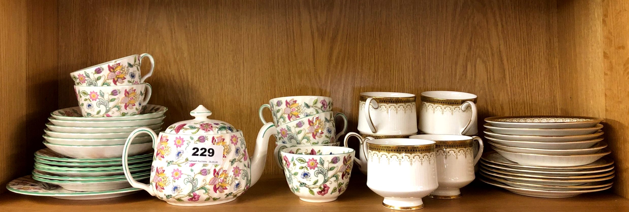 A Minton tea set (tea pot A/F), together with a paragon Athena pattern tea set.