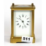 A striking gilt brass carriage clock, H. 13cm. Condition - Appears to be working but not tested