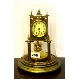 A vintage F. Zacher & Comp single weight torsion pendulum clock with glass dome, overall H. 27cm.
