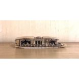 A 1920's Chinese carved hardstone scholars seal in the form of a river barge, L. 8cm. Condition -