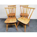 A set of four vintage country chairs.