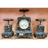 A 19th century French green marble clock garniture mounted on lion's paw feet, H. 34cm.