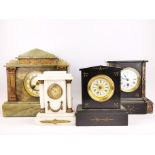 Four Victorian stone mantel clocks, tallest H. 30cm. Condition - All movements appear to be complete